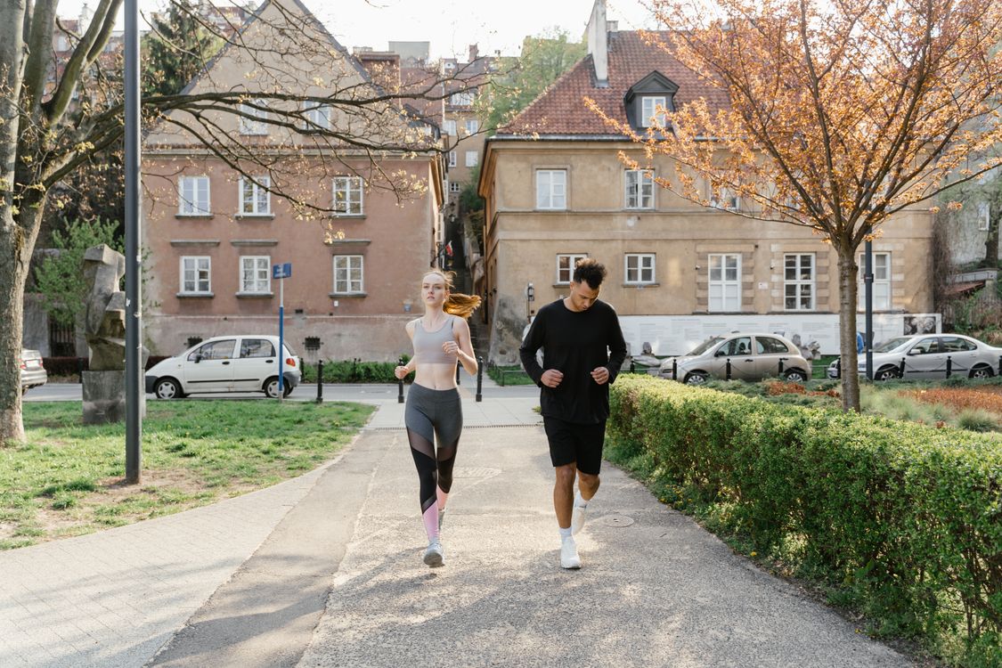 Illustrative stock photograph of people jogging outdoors
